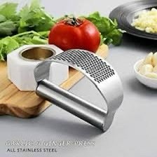 INSTANT GARLIC PRESS