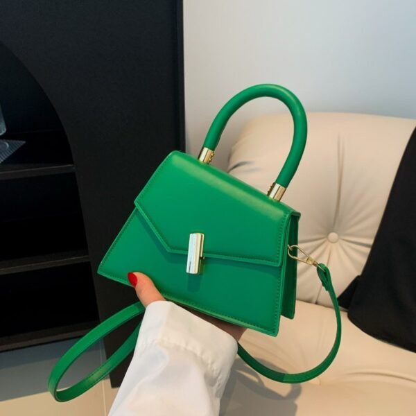 Emerald Twist Top Handle Mini Bag