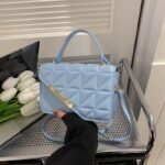 Luxury Quilted Handbag with Gold Accent