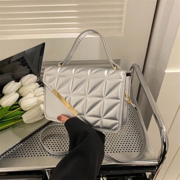 Luxury Quilted Handbag with Gold Accent