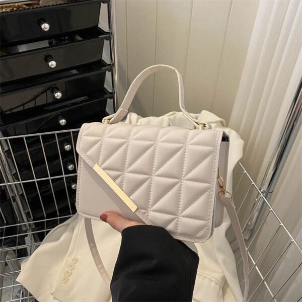 Luxury Quilted Handbag with Gold Accent